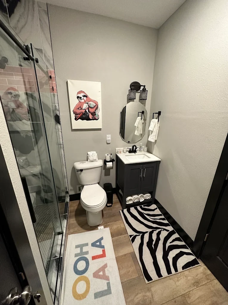 Bathroom with shower and vanity