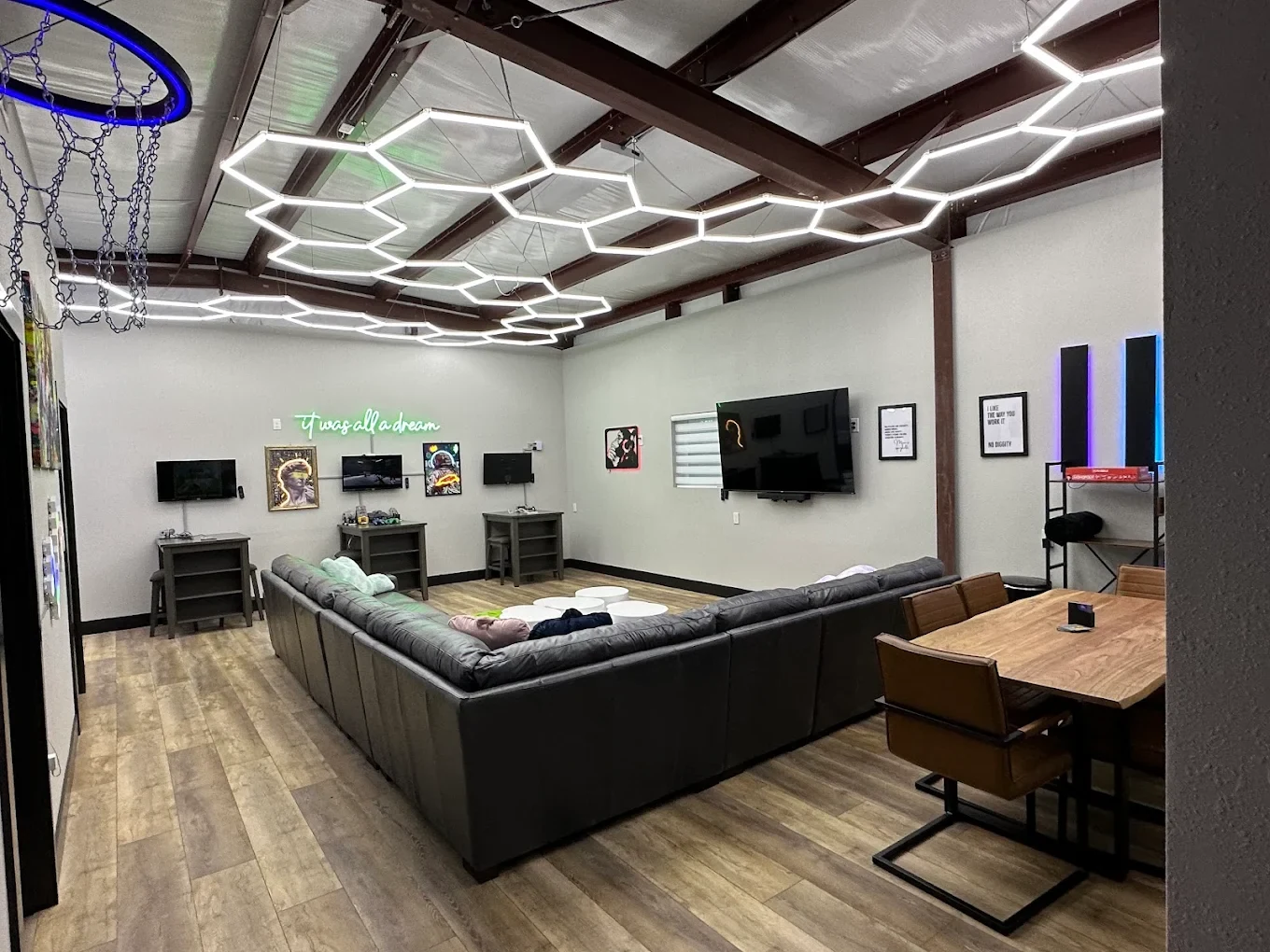 Game room with geometric ceiling lighting