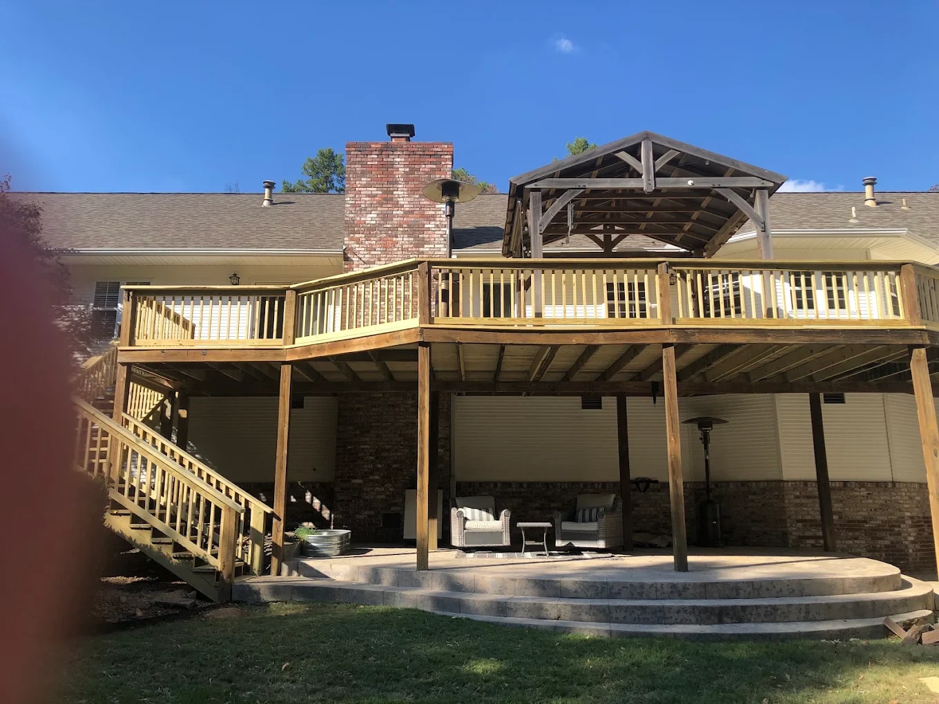 Raised deck with stairs and covered seating
