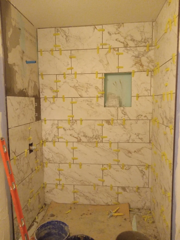 Shower tile and recessed niche during installation